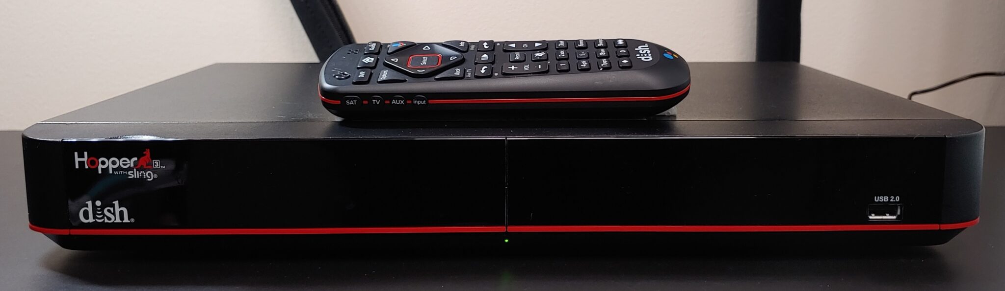 Dish Hopper 3 receiver alongside the voice remote